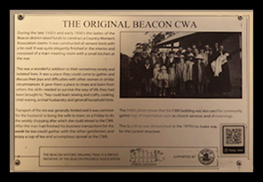 A Historic Walking Trail plaque of the original Beacon Country Woman's Association